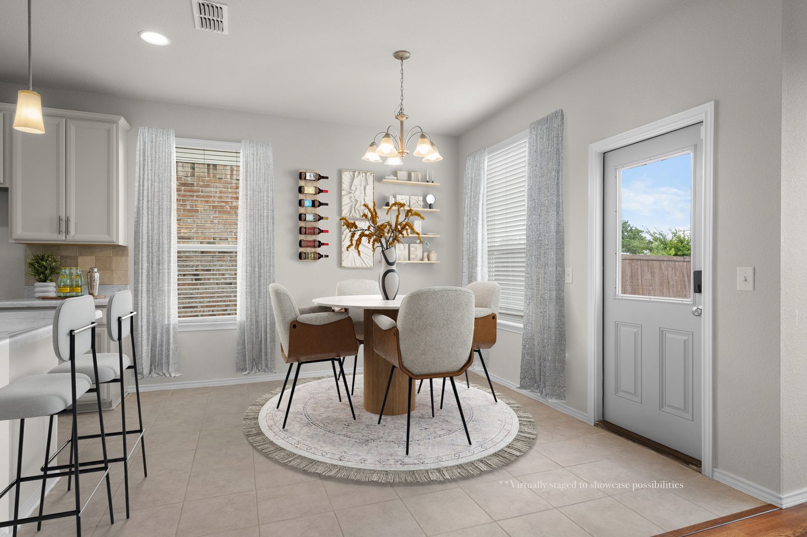 Breakfast room virtually staged with round table, chairs and shelving